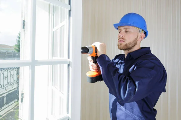 Construction Worker Using Drill Install Replacement Window — Stock Photo, Image
