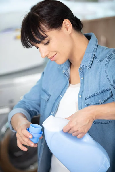 Close Female Pouring Detergent Blue Bottle Cap — Zdjęcie stockowe