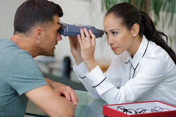 Optician Examining Patients Eyes — Stock Photo, Image