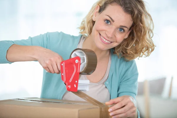 Woman Sealing Parcel Tape Dispenser — Stock Photo, Image