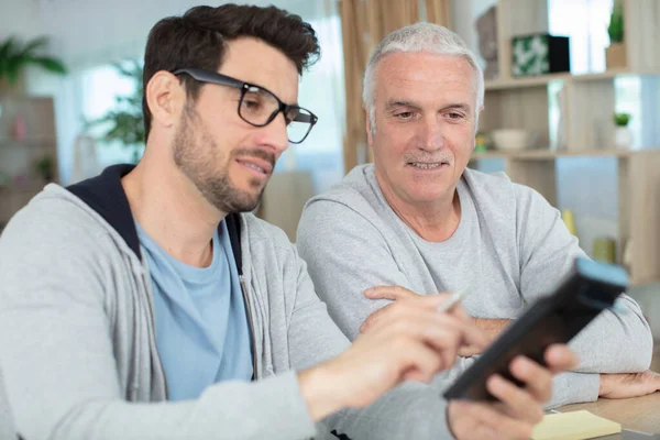 Hipster Son His Senior Father Home — Stock Photo, Image