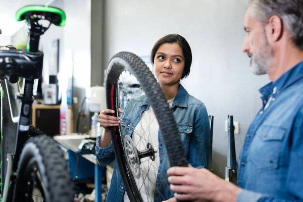 Woman Checking Bicycle Tire Shop Factory — Stock Photo, Image