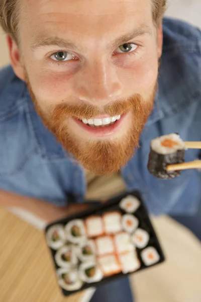 Man Holding Sushi Chopsticks Top View — Stock Photo, Image