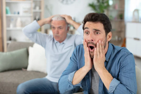 Men Sit Couch Watch Football Game — Stock Photo, Image