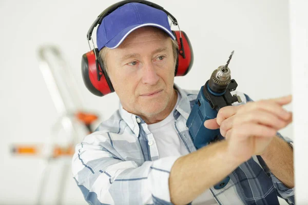 Senior Carpenter Master Works Drill — Stock Photo, Image