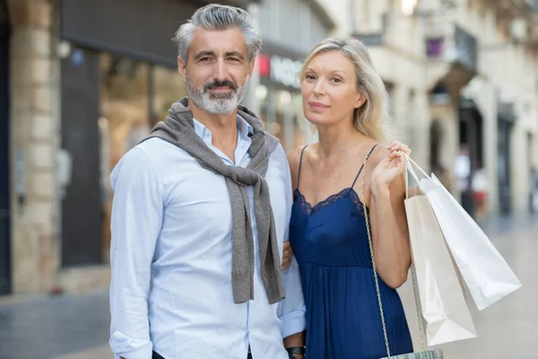 Mature Couple Shopping Together Outdoors — Stock Photo, Image