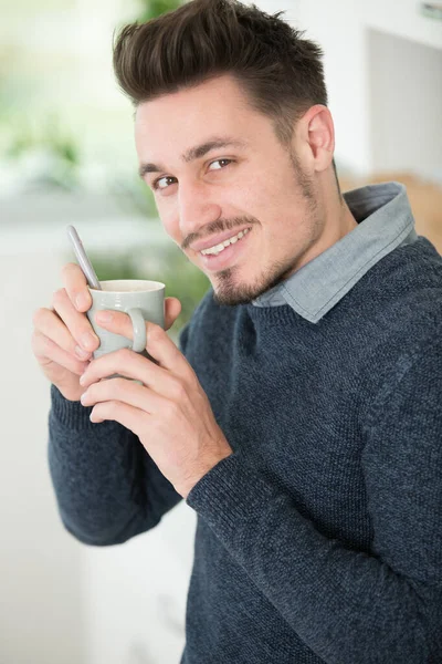 Cheery Youthful Guy Resting Mug Hot Beverage Indoor — Stock Photo, Image