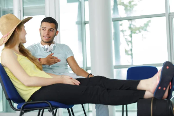 Happy Young Tourists Sitting Airport Lounge — Stock Photo, Image