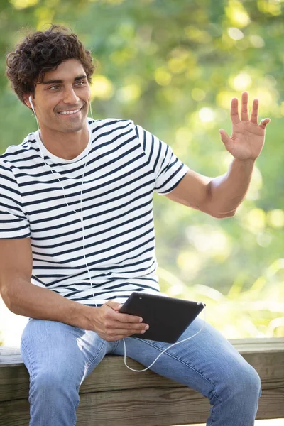 Cheerful Fashionable Handsome Man Using Tablet While Waving Someone — Stock Photo, Image