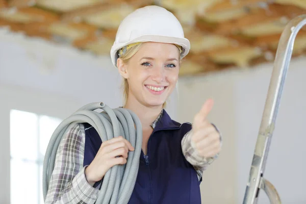 Female Property Developper Making Thumbs Gesture — Stock Photo, Image