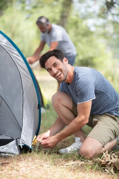 Friends Putting Camping Tent Forest — Stock Photo, Image