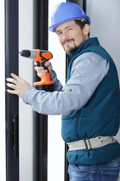 Handsome Male Worker Unmounting Old Wooden Construction — Stock Photo, Image