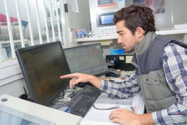 a factory software maintenance worker clipart