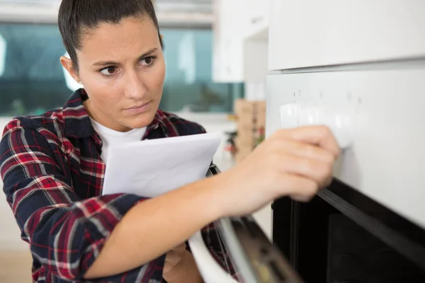 Repair Woman Checks Oven Factory — Stock Photo, Image