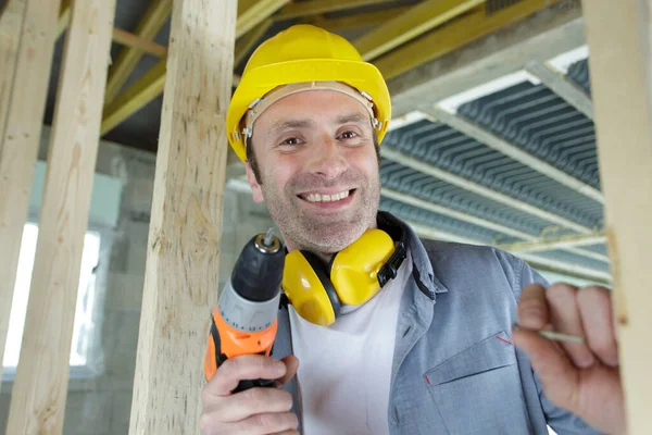 Young Man Holding Drill Construction Site — Stock Photo, Image