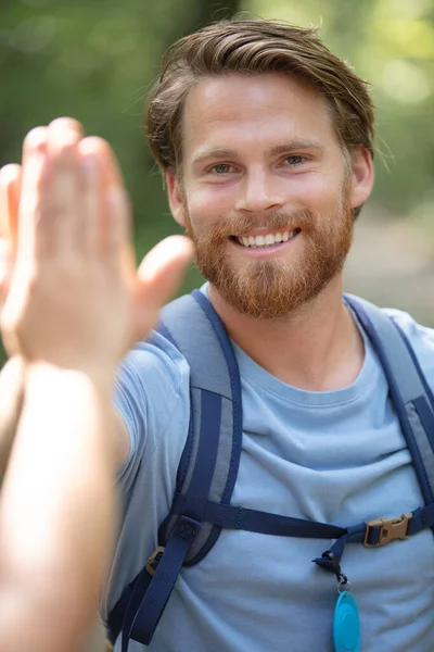 Backpacker Doing High Five — Stock Photo, Image