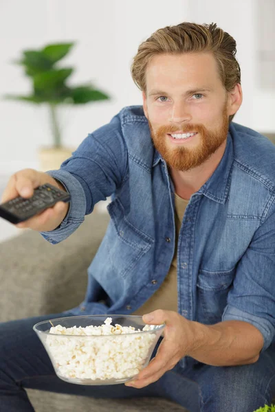 Male Hands Remote Control Popcorn — Stockfoto