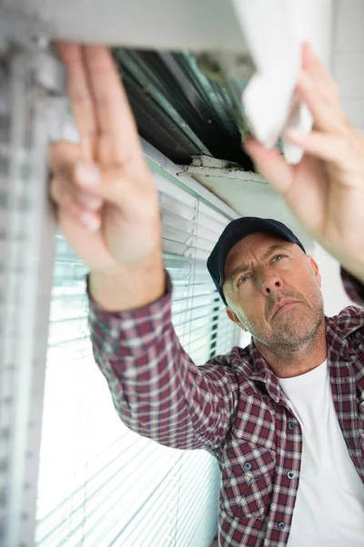 Repairman Fixing Window — Stock Photo, Image