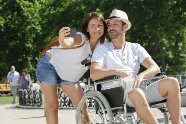 Woman Taking Selfie Her Paralyzed Husband City — Stock Photo, Image