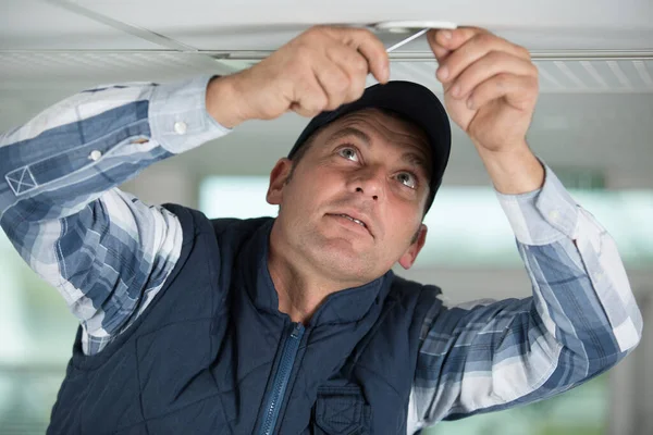 Concentrated Handyman Working Spotlight Ceiling — Stock Photo, Image