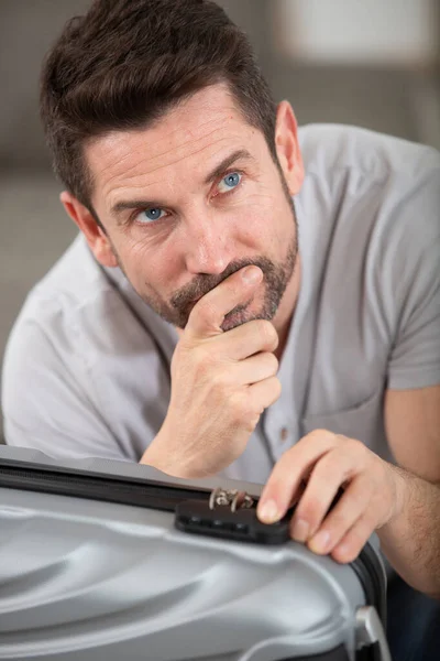 Man Trying Remember Code His Suitcase Lock — Stock Photo, Image