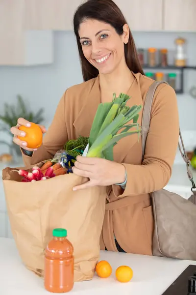 Smiling Young Housewife Shopping Bag Full Vegetables — Stockfoto