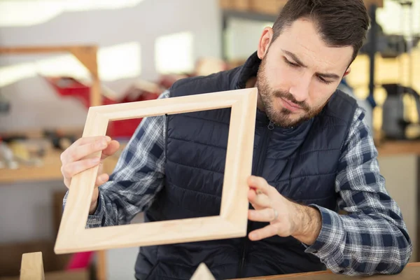 Professional Carpenter Looking Wooden Frame — Stock Photo, Image
