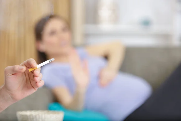 Selfish Man Smoking Cigarette Pregnant Woman — Stock Photo, Image