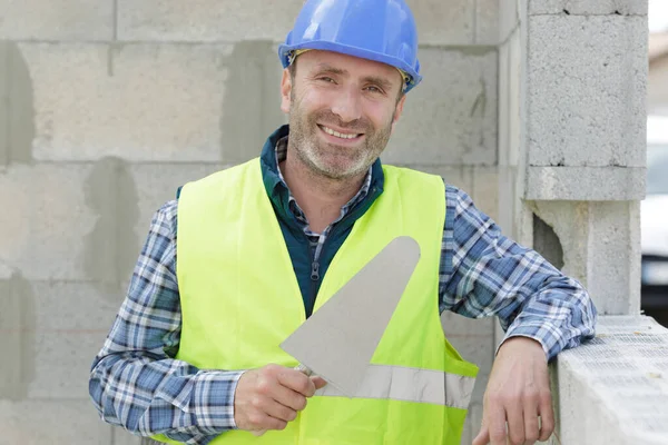 Ein Leitender Bauarbeiter Mit Spachtel — Stockfoto