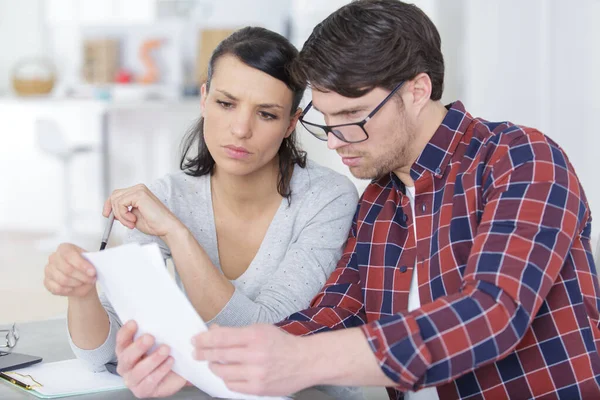 young couple managing finances together