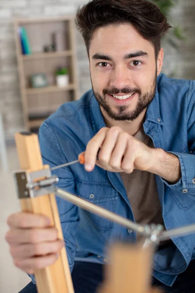 Man Putting Together Self Assembly Furniture New Home — Stock Photo, Image