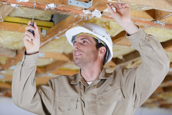 Builder Screwing Fastener Wooden Roof Joist — Stock Photo, Image