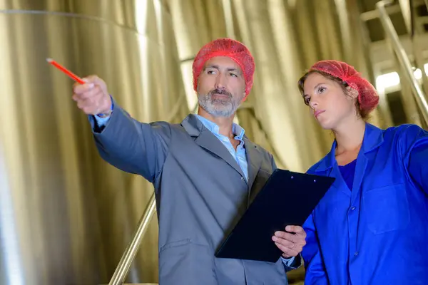 Man Woman Wearing Hairnets Pointing — Stock Photo, Image