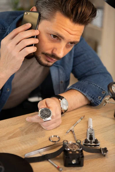 Man Phone Repairing Watch — Stock Photo, Image