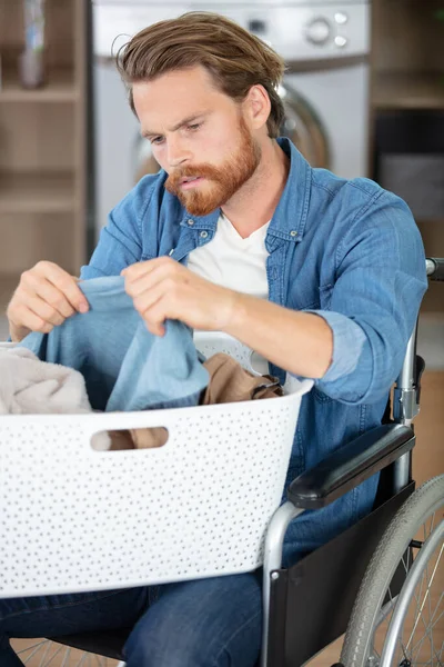 Disabled Man Wheelchair Doing Laundry — Stock Photo, Image