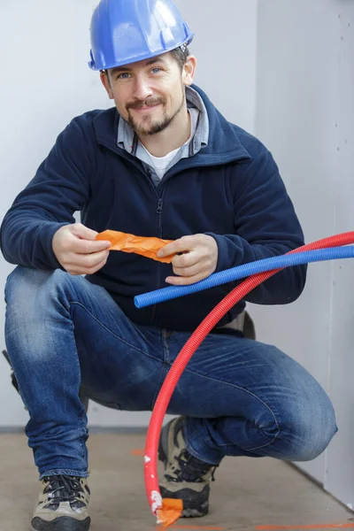 Male Builder Pipes — Stock Photo, Image