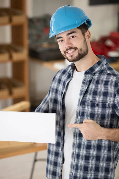 Young Builder Man Pointing White Blank Banner — Stock Photo, Image