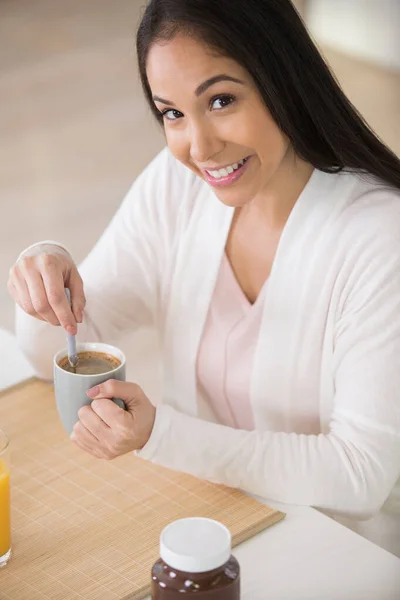 happy woman having a coffee