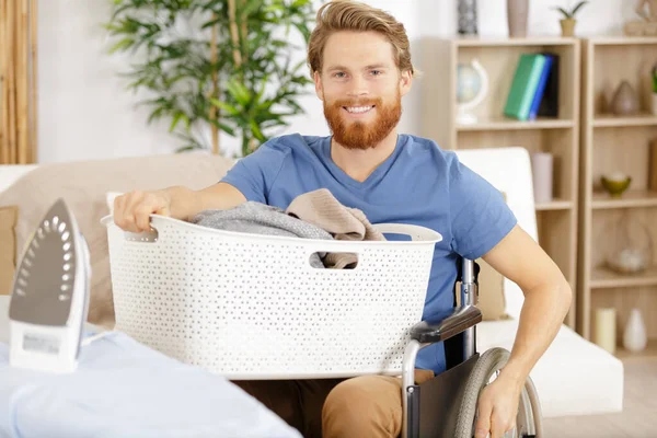 Happy Disabled Man Wheelchair Doing Laundry — Stock Photo, Image