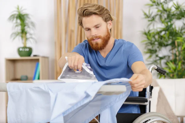 Disabled Man Ironing Home — Stock Photo, Image