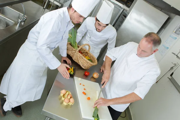 Chef Cooking Apprentices — Stock Photo, Image