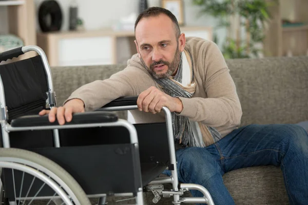 Man Trying Reach His Wheelchair — Stock Photo, Image