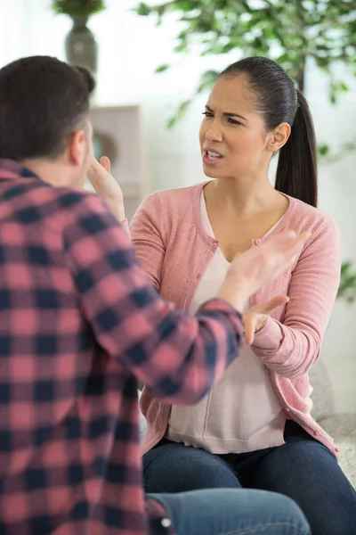 couple arguing at home problems in relationship
