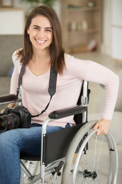 Wheelchair Bound Woman Home Holding Camera — Stock Photo, Image
