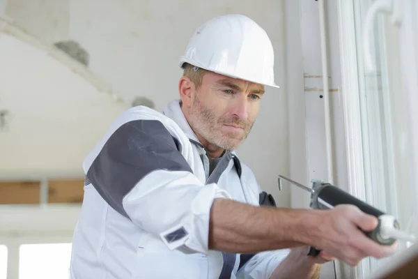 Construction Worker Installing Window House Stock Picture