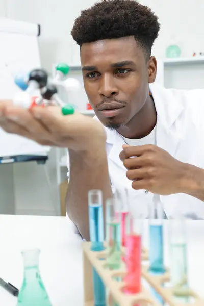 Handsome Researcher Mixing Color Test Tube — Stock Photo, Image