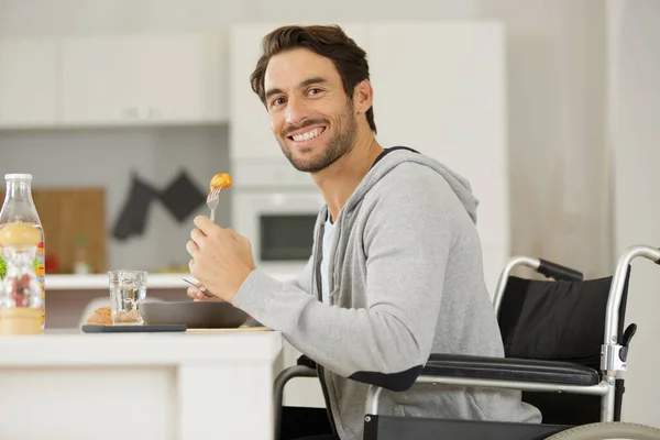 Handicapped Man Eating Meal Home — Stock Photo, Image