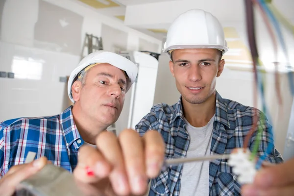 Apprentice Electrician Joining Cables Fuse — Stock Photo, Image