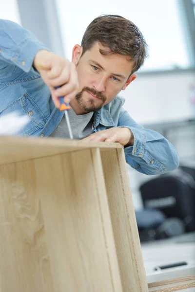 Man Assembling Furniture Chipboard Boards — Stock Photo, Image