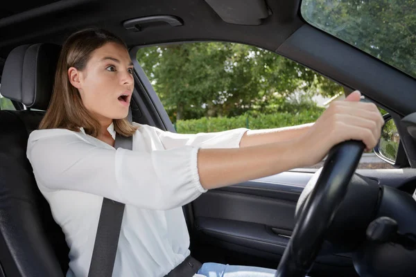 Young Shocked Woman While Driving Car — Stock Photo, Image